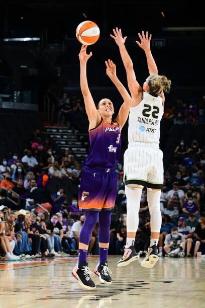 Diana Taurasi of the Phoenix Mercury shoots the ball over Courtney Vandersloot of the Chicago Sky on August 31, 2021 at the Footprint Center in...