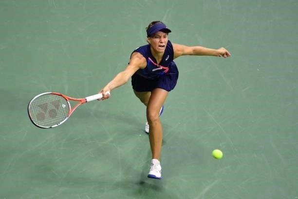 Switzerland's Viktorija Golubic hits a return to Canada's Bianca Andreescu during their 2021 US Open Tennis tournament women's singles first round...