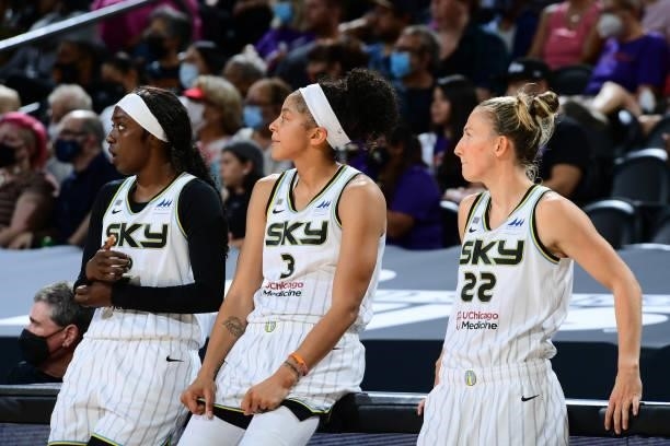 Kahleah Copper, Candace Parker and Courtney Vandersloot of the Chicago Sky look on during the game against the Phoenix Mercury on August 31, 2021 at...