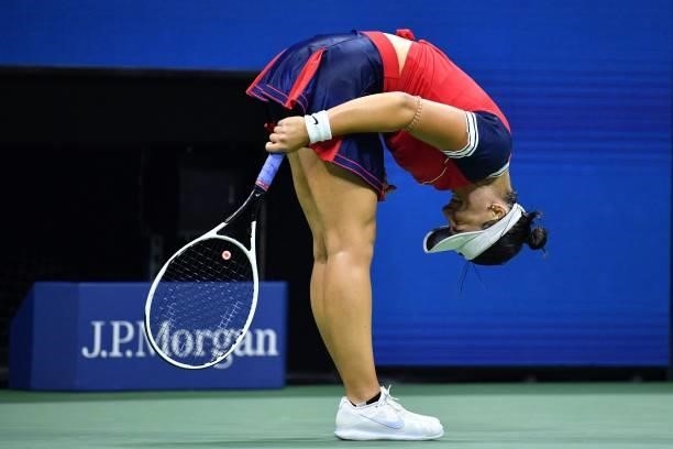 Canada's Bianca Andreescu celebrates after winning her 2021 US Open Tennis tournament women's singles first round match against Switzerland's...