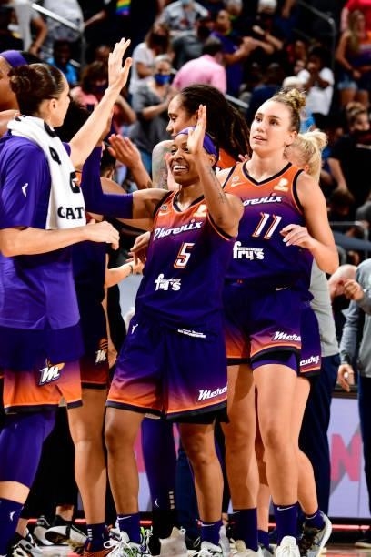 Shey Peddy of the Phoenix Mercury high fives her teammates during the game against the Chicago Sky on August 31, 2021 at Footprint Center in Phoenix,...