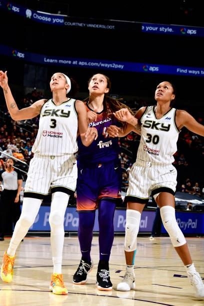 Candace Parker and Azura Stevens of the Chicago Sky fight for position against Brittney Griner of the Phoenix Mercury during the game on August 31,...