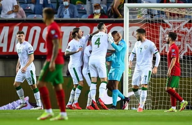 Faro , Portugal - 1 September 2021; Republic of Ireland goalkeeper Gavin Bazunu is congratulated by his team-mates after saving the penalty of...