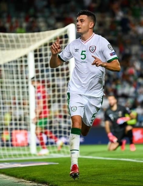 Faro , Portugal - 1 September 2021; John Egan of Republic of Ireland celebrates after scoring his side's first goal during the FIFA World Cup 2022...