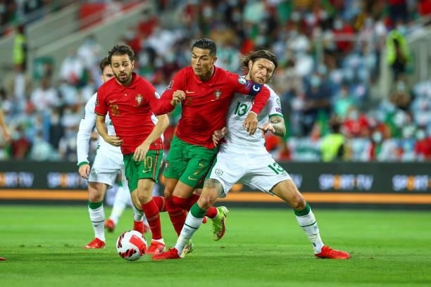 Cristiano Ronaldo of Manchester United and Portugal vies with Jeff Hendrick of Republic of Ireland and Newcastle United for ball possession during...
