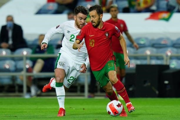 Bernardo Silva of Manchester City and Portugal with Aaron Connolly of Republic of Ireland and Brighton in action during the World Cup 2022 Qualifier...