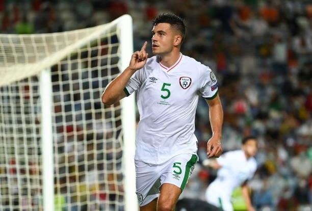 Faro , Portugal - 1 September 2021; John Egan of Republic of Ireland celebrates after scoring his side's first goal during the FIFA World Cup 2022...