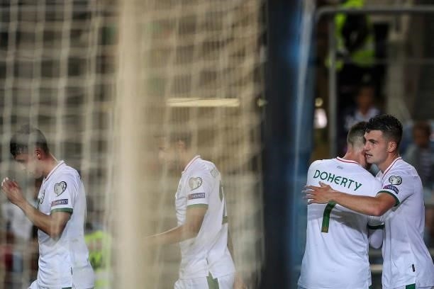 Republic of Ireland's defender John Egan celebrates with Republic of Ireland's defender Matt Doherty after scoring a goal during the FIFA World Cup...