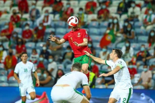 Diogo Jota of Liverpool FC and Portugal higher heads the ball during the 2022 FIFA World Cup Qualifier match between Portugal and Republic of Ireland...