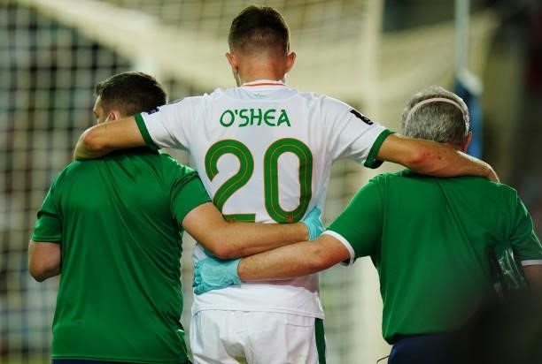 Dara O'Shea of Republic of Ireland and West Bromwich Albion leaves the pitch injured during the World Cup 2022 Qualifier match between Portugal and...
