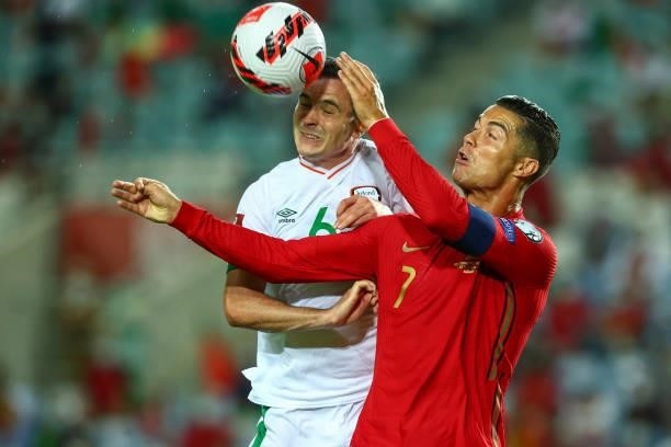 Josh Cullen of Republic of Ireland and Anderlecht vies with Cristiano Ronaldo of Manchester United and Portugal for the ball possession during the...