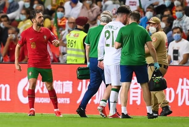 Faro , Portugal - 1 September 2021; Bernardo Silva of Portugal exchanges words with Aaron Connolly of Republic of Ireland as he leaves the pitch with...