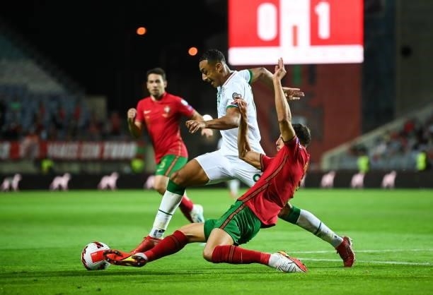 Faro , Portugal - 1 September 2021; Adam Idah of Republic of Ireland in action against Rúben Dias of Portugal during the FIFA World Cup 2022...