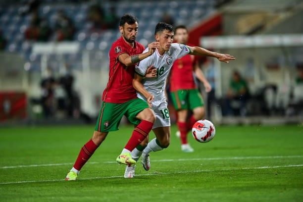 Faro , Portugal - 1 September 2021; Bruno Fernandes of Portugal in action against Jamie McGrath of Republic of Ireland during the FIFA World Cup 2022...
