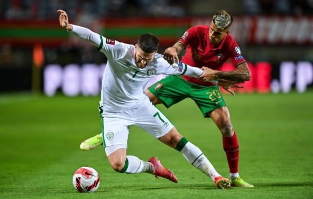 Faro , Portugal - 1 September 2021; Matt Doherty of Republic of Ireland in action against João Cancelo of Portugal during the FIFA World Cup 2022...