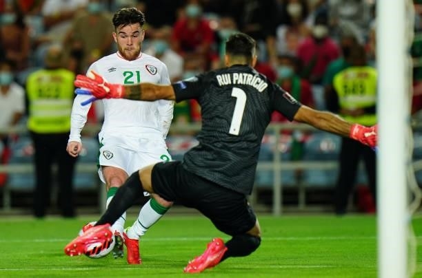 Aaron Connolly of Republic of Ireland and Brighton with Rui Patricio of AS Roma and Portugal in action during the World Cup 2022 Qualifier match...