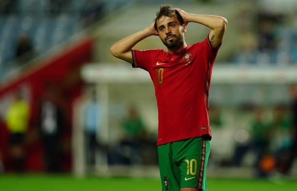 Bernardo Silva of Manchester City and Portugal reacts after missing a goal opportunity during the World Cup 2022 Qualifier match between Portugal and...