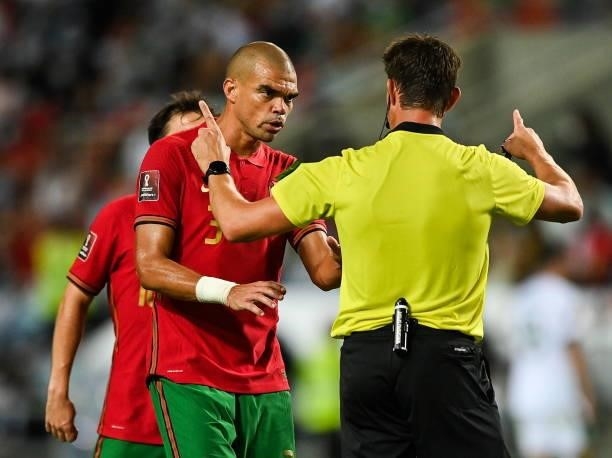Faro , Portugal - 1 September 2021; Pepe of Portugal and referee Matej Jug during the FIFA World Cup 2022 qualifying group A match between Portugal...