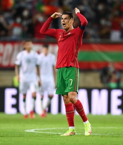 Faro , Portugal - 1 September 2021; Cristiano Ronaldo of Portugal encourages the supporters after scoring his side's first goal during the FIFA World...