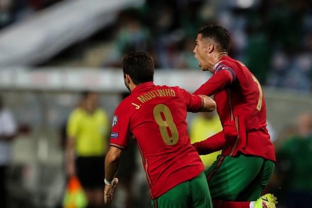 Portugal's forward Cristiano Ronaldo celebrates with Portugal's midfielder Joao Moutinho after scoring a goal during the FIFA World Cup Qatar 2022...