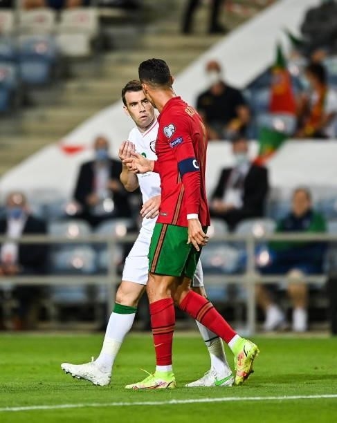 Faro , Portugal - 1 September 2021; Seamus Coleman of Republic of Ireland and Cristiano Ronaldo of Portugal during the FIFA World Cup 2022 qualifying...