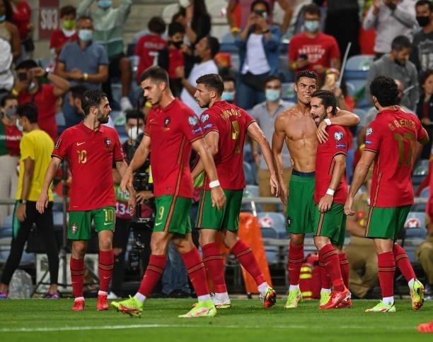 Faro , Portugal - 1 September 2021; Cristiano Ronaldo of Portugal celebrates with team-mates after scoring their side's second goal during the FIFA...