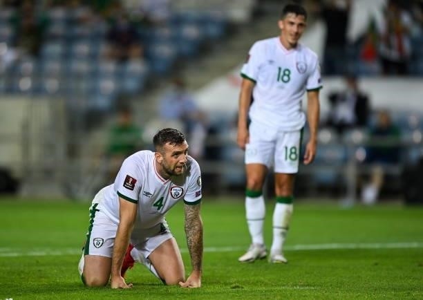 Faro , Portugal - 1 September 2021; Shane Duffy of Republic of Ireland reacts after his side concede a goal, scored by Cristiano Ronaldo of Portugal,...