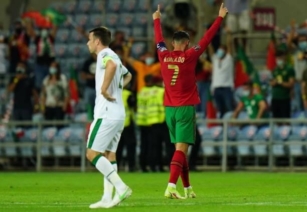 Goal scorer Cristiano Ronaldo of Manchester United and Portugal celebrates the victory at the end of the World Cup 2022 Qualifier match between...
