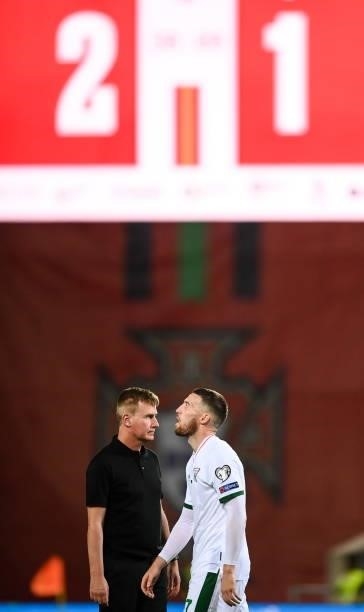 Faro , Portugal - 1 September 2021; Republic of Ireland manager Stephen Kenny, left, and Matt Doherty of Republic of Ireland reacts after their...