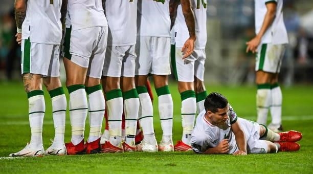 Faro , Portugal - 1 September 2021; Josh Cullen of Republic of Ireland lies behind his side's wall before a freekick during the FIFA World Cup 2022...