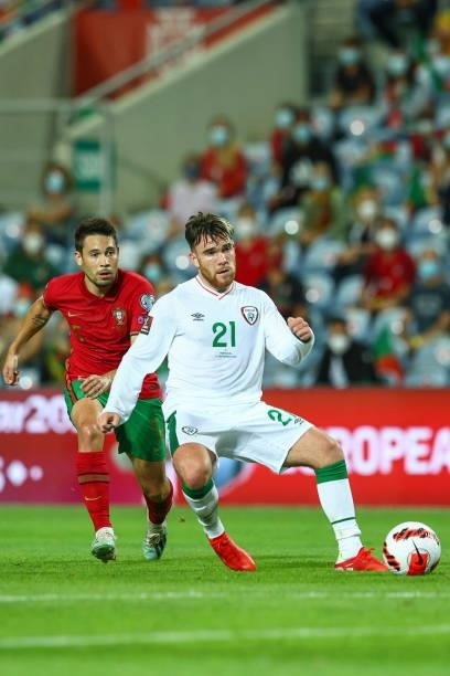 Aaron Connolly of Republic of Ireland and Brighton tries to escape Raphael Guerreiro of Borussia Dortmund during the 2022 FIFA World Cup Qualifier...