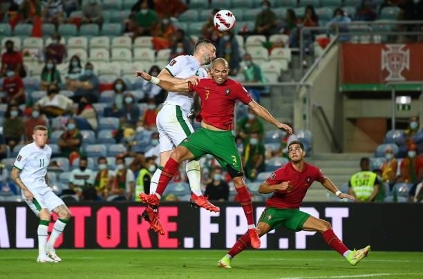 Faro , Portugal - 1 September 2021; Pepe of Portugal and Shane Duffy of Republic of Ireland during the FIFA World Cup 2022 qualifying group A match...