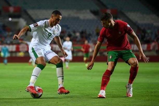 Faro , Portugal - 1 September 2021; Adam Idah of Republic of Ireland and Rúben Dias of Portugal during the FIFA World Cup 2022 qualifying group A...