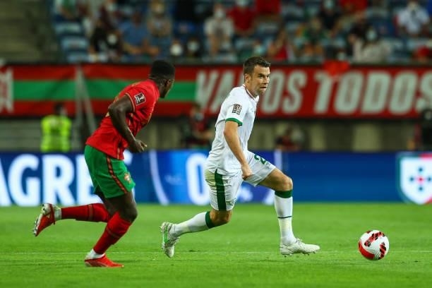 Seamus Coleman of Republic of Ireland and Everton tries to escape Nuno Mendes of Sporting CP and Portugal during the 2022 FIFA World Cup Qualifier...