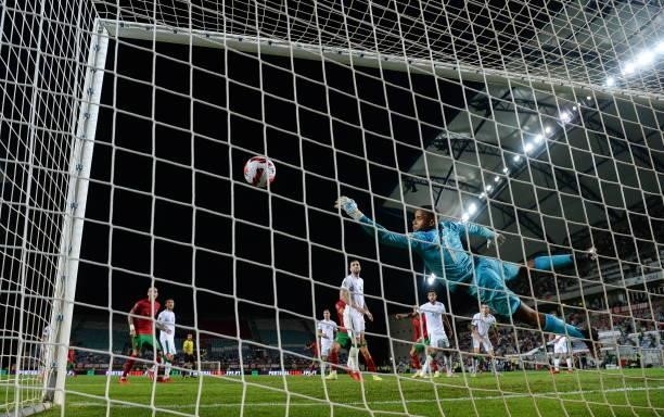 Faro , Portugal - 1 September 2021; Cristiano Ronaldo of Portugal scores his side's second goal past Republic of Ireland goalkeeper Gavin Bazunu...