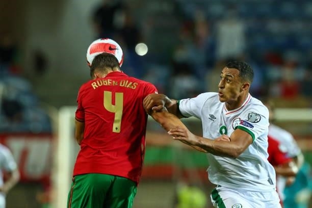 Ruben Dias of Manchester City and Portugal vies with Adam Idah of Republic of Ireland and Norwich City for the ball possession during the 2022 FIFA...