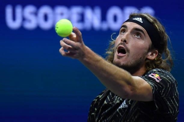 Greece's Stefanos Tsitsipas serves to France's Adrian Mannarino during their 2021 US Open Tennis tournament men's singles second round match at the...