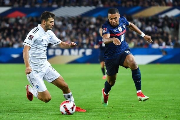 Kylian MBAPPE of France and Branimir CIPETIC of Bosnia and Herzegovina during the FIFA World Cup 2022 Qatar qualifying match between France and...