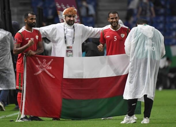 Juma Marhoon Al Habsi and Abudulaziz Al Gheilani of Oman pose for photograph of the win during FIFA World Cup Asian Qualifier Final Round Group B...