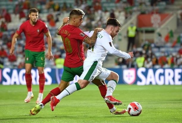 Faro , Portugal - 1 September 2021; Aaron Connolly of Republic of Ireland in action against João Cancelo of Portugal during the FIFA World Cup 2022...
