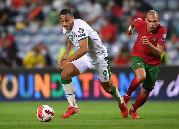 Faro , Portugal - 1 September 2021; Adam Idah of Republic of Ireland in action against Pepe of Portugal during the FIFA World Cup 2022 qualifying...