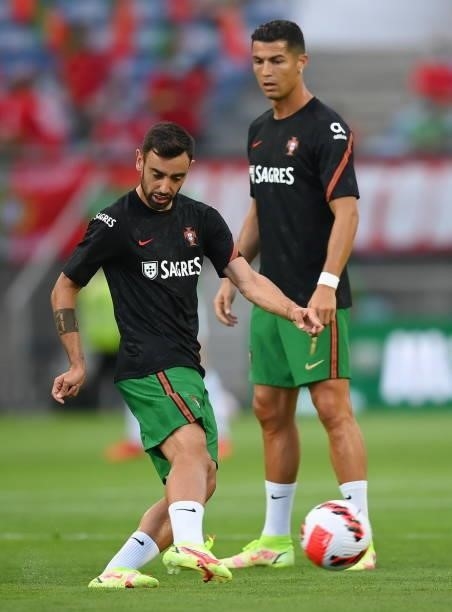 Faro , Portugal - 1 September 2021; Bruno Fernandes and Cristiano Ronaldo of Portugal before the FIFA World Cup 2022 qualifying group A match between...