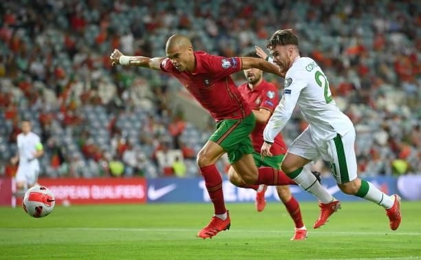 Faro , Portugal - 1 September 2021; Pepe of Portugal in action against Aaron Connolly of Republic of Ireland during the FIFA World Cup 2022...