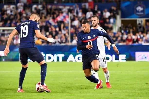 Karim BENZEMA and Kylian MBAPPE of France and Miralem PJANIC of Bosnia during the FIFA World Cup 2022 Qatar qualifying match between France and...