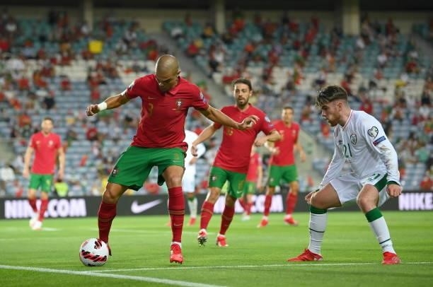 Faro , Portugal - 1 September 2021; Pepe of Portugal in action against Aaron Connolly of Republic of Ireland during the FIFA World Cup 2022...