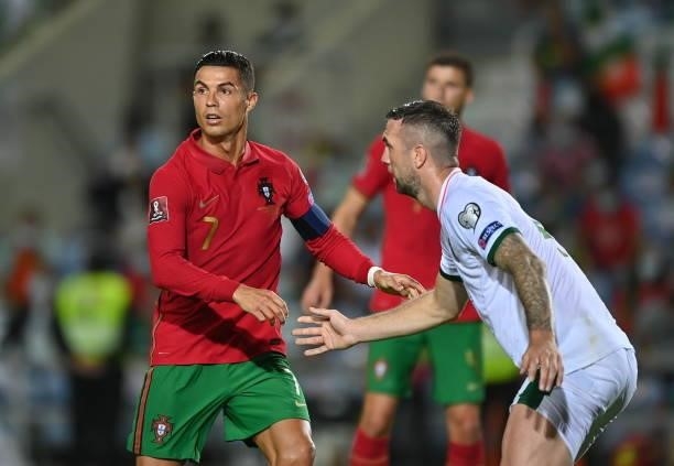 Faro , Portugal - 1 September 2021; Cristiano Ronaldo of Portugal and Shane Duffy of Republic of Ireland during the FIFA World Cup 2022 qualifying...