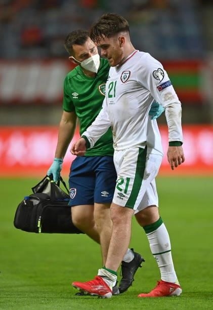 Faro , Portugal - 1 September 2021; Aaron Connolly of Republic of Ireland and Republic of Ireland chartered physiotherapist Kevin Mulholland during...