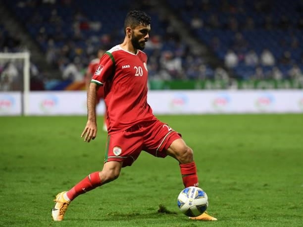 Salaah Said Al Yahyaei of Oman passes the ball during FIFA World Cup Asian Qualifier Final Round Group B match between Japan and Oman at Panasonic...