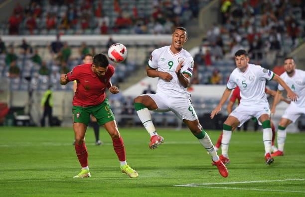 Faro , Portugal - 1 September 2021; André Silva of Portugal in action against Adam Idah of Republic of Ireland during the FIFA World Cup 2022...