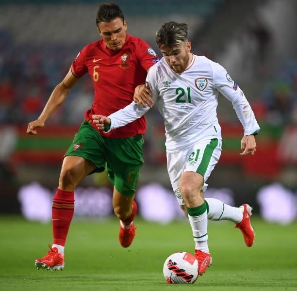 Faro , Portugal - 1 September 2021; Aaron Connolly of Republic of Ireland in action against João Palhinha of Portugal during the FIFA World Cup 2022...